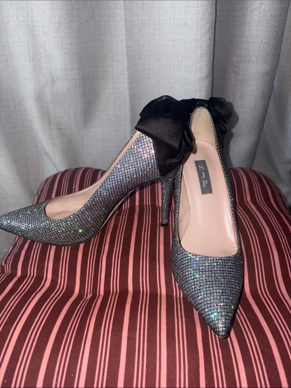 SJP by Sarah Jessica Parker Silver Glitter Pointed Pumps with Black Bow